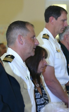 Representing the military at the Mass were, from left, Commander Mike Giardino of Naval Air Station Key West, and Captain Matt Kohler of the Joint Interagency Task Force South, based in Key West.