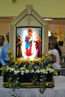 An image of Our Lady of Chiquinquirá is on display at the reception which followed the Mass.