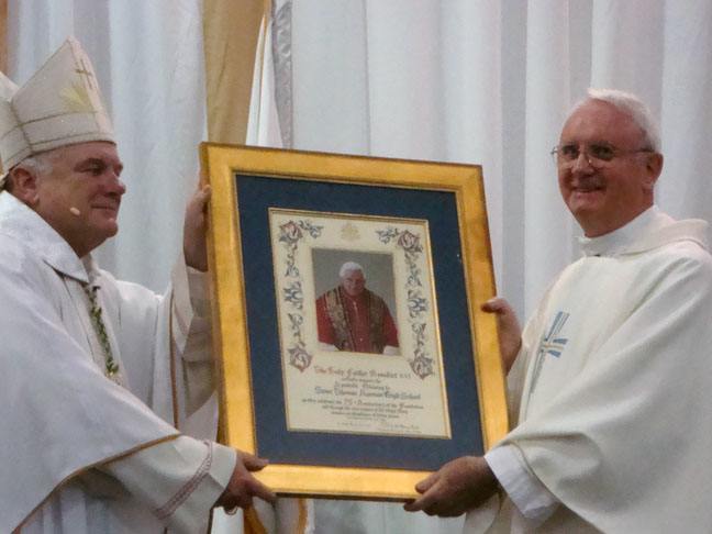 Archbishop Thomas Wenski and Msgr. Vincent T. Kelly accept the blessing from Pope Benedict XVI in celebration of St. Thomas Aquinas High School's 75th anniversary.