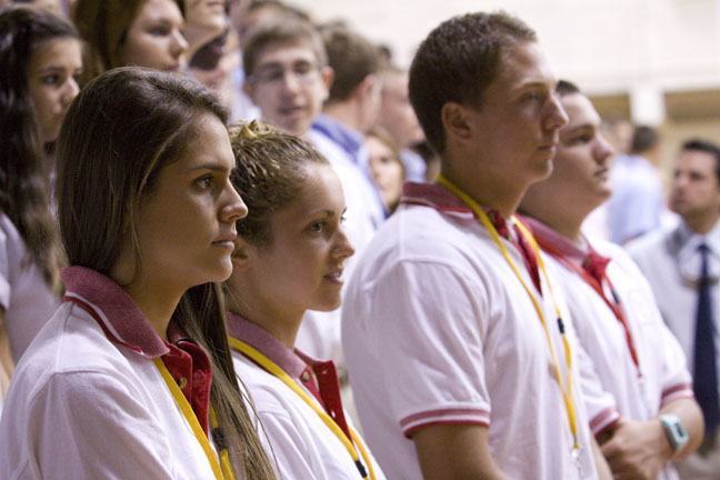 From left, students Anneka McCombs, Sarah Bogdan, William Costa and Michael Hanke take part in Cardinal Gibbons High School's 50th anniversary Mass.