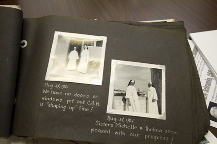 "We have no doors or windows yet, but CGH is shaping up fine!" says this scrapbook entry from August 1961. Sister Schramko, wearing a full habit, is on the left.