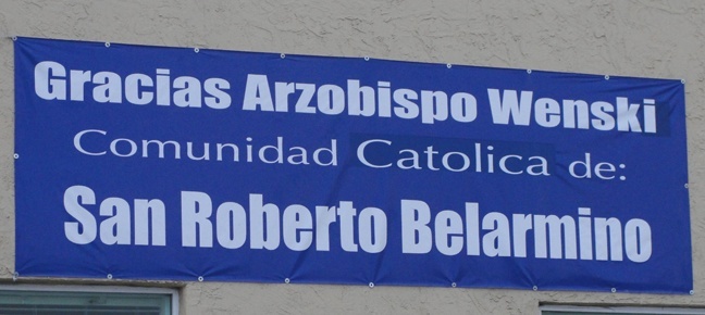 A sign thanks Archbishop Thomas Wenski for allowing the re-opening of St. Robert Bellarmine Church as a mission of Corpus Christi Parish.