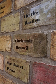 The names of the dead are written on the bricks that make up perhaps the only monument in Haiti built to honor the victims of the Jan. 12 earthquake.