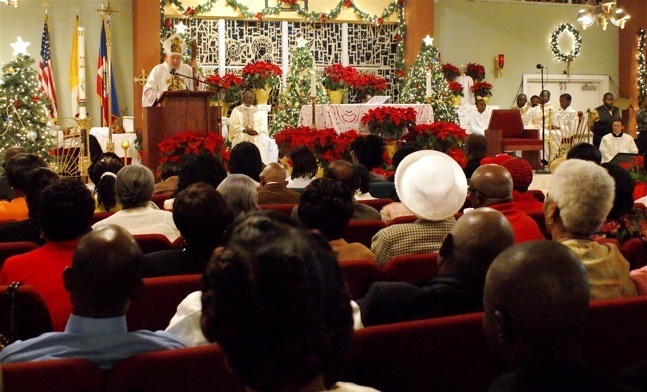 At midnight, the bells of the church rang to symbolize the New Year during Mass celebrated by Archbishop Thomas Wenski.