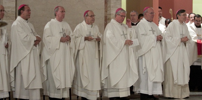 From left, bishops who attended the Mass included: Bishop Victor Galeone, retired of St. Augustine: Bishop Fernando Isern of Pueblo, Colo.; Bishop John Noonan of Orlando; Bishop Felipe Estevez of St. Augustine; Bishop Frank Dewane of Venice; Bishop Robert Lynch of St. Petersburg; and Bishop Gerald Barbarito of Palm Beach.