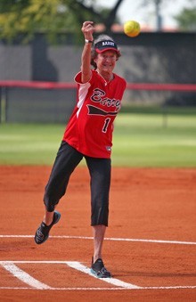 Sister Madonna Buder throws out the first pitch at a softball game between Barry University and Mulloy College of Rockville Centre, N.Y.