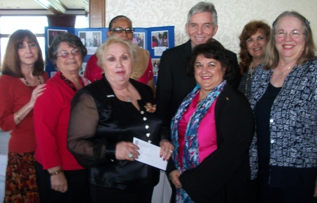 Members of the Miami Archdiocesan Council of Catholic Women's (MACCW) Scholarship Committee pose with Father Michael Greer, pastor of Assumption Parish in Lauderdale-by-the-Sea and moderator of the archdiocesan council.