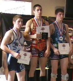 National wrestling champion Javier Rodriguez (center) is pictured on the winner's podium at the Brute Adidas National Tournament, which took place in Independence, Missouri in April.