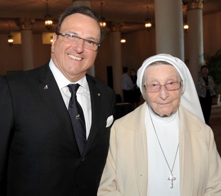 Sister Lucia Ceccotti, founder and executive director of the Marian Center, poses with Art Furia, general counsel of the National Italian American Foundation.
