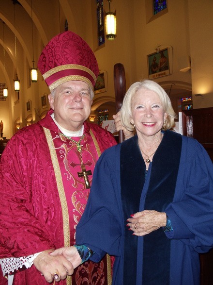Archbishop Thomas Wenski poses with the Honorable Lurana S. Snow, Federal Magistrate for the U. S. District Court for the Southern District of Florida, and recipient of the St. Thomas More Society's annual Archbishop Edward McCarthy Award.