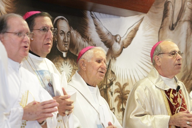 Cuban bishops serving on the island and in the U.S. celebrate Mass together at the Shrine of Our Lady of Charity; from left, Bishop Arturo Gonzalez of Santa Clara; Bishop Agustin Roman of Miami; and Bishop Felipe Estevez of St. Augustine.