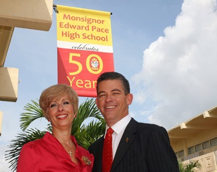 Ana Garcia, current Pace principal, poses with her husband, Eddy, principal of Immaculate Conception School in Hialeah. The two met at Pace and are members of the 1980 graduating class.