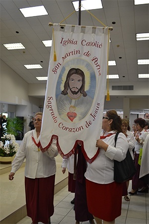 Members of a spiritual group process into church.
