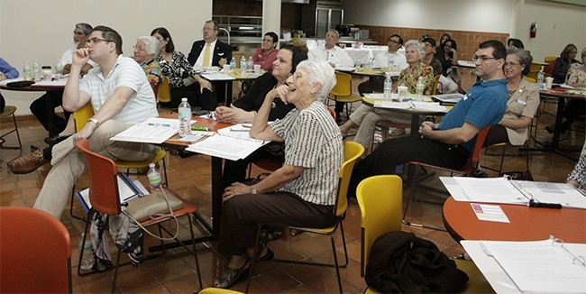 Members of the Synod focus team on Adult Faith Formation listen to Synod Director Rosemarie Banich at their first meeting.