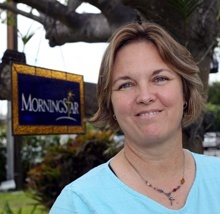 Sue DeFerrari, director of MorningStar Renewal Center, poses for a picture on the grounds.