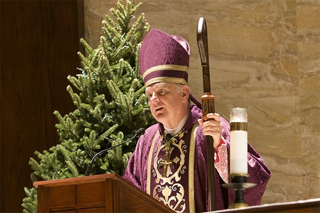 Archbishop Thomas Wenski preaches the homily to Pastoral Center employees.