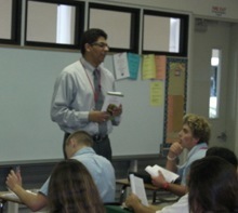Theology teacher Nelson Araque teaches a class using the new technology.