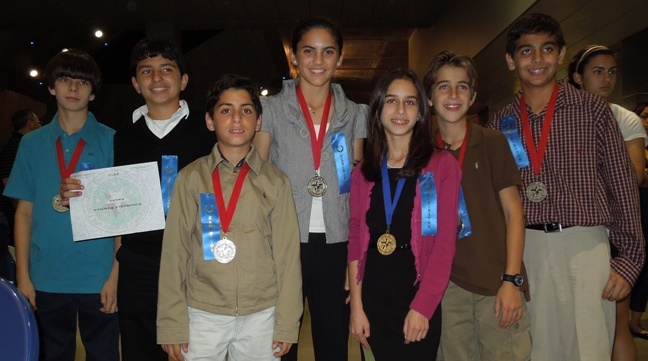 From left, Blessed Trinity students who received 1 Superior Award, 7 Awards of Excellence and 1 Honorable Mention at the South Florida Regional Science and Engineering Fair: Sebastian Plasencia, Jon Rodriguez, Alejandro Aloma, Daniella Diaz, Daniela Rodriguez, Sebastian Ortiz, Alejandro Carrillo, not pictured:  Kristina Moya and Maria Elena Petrovich.