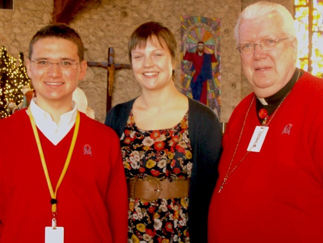 Rachel Baumgartner Lozano is pictured here with Marianist Father Larry Doersching, president of Chaminade-Madonna College Preparatory, and junior student James Kardys. Father Doersching has been praying for the beatification of Blessed Joseph William Chaminade, his order's founder, since he was in high school. The miracle Lozano ascribes to his intercession, if confirmed by Rome, might be the last step in that canonization process.