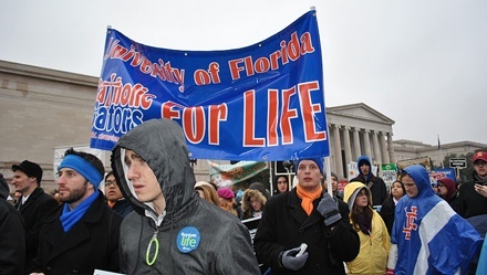 UF Catholic Gators hold their banner high as they walk down Capitol Hill at the March for Life Jan. 23.