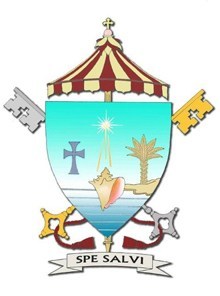 The Coat of Arms for the Basilica of St. Mary Star of the Sea, Key West: Based on the coat of arms of the Archdiocese of Miami, the position of the sand indicates that this parish was the beginning of the Archdiocese of Miami and is at the end of it. The conch shell is the conventional symbol of Key West. Of course, the star is for the parish's patroness. Below the cross and above the ombrellino is a conch pearl. The motto: Pope Benedict XVI introduced his second encyclical letter with the title, "Spe Salvi facti sumus" ("in hope we were saved") as St. Paul said to the Romans and likewise to us (Rom 8:24). Pope Benedict XVI concludes Spe Salvi with a comprehensive reflection on the parish's patroness, Stella Maris, Mary Star of the Sea.