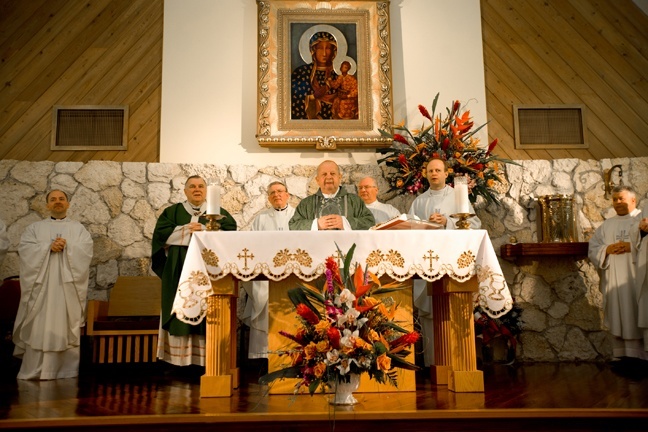 Cardinal Stanislaw Dziwisz celebrates Mass in Polish at Our Lady of Czestochowa Mission in Pompano Beach, accompanied by Archbishop Thomas Wenski and the Polish priests who staff the mission.