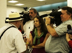 The media interview Cuba pilgrim and Miami businessman Carlos Saladrigas before he gets on the plane to Cuba.