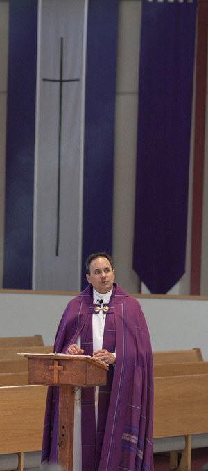 Father David Zirilli shares some final thoughts with the sixth graders during the conclusion of Focus 11: adoration of Jesus in the Blessed Sacrament.