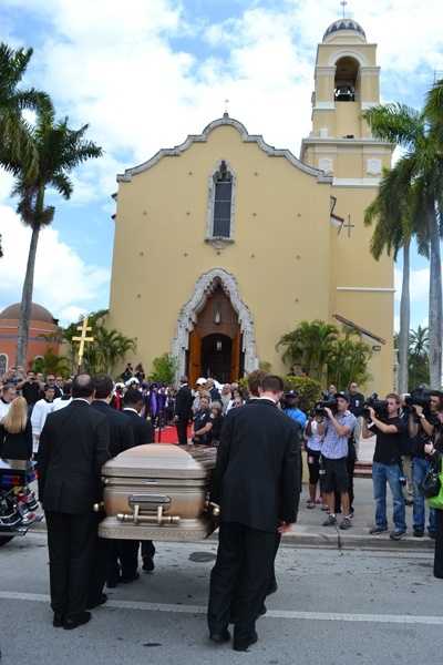 Bishop Agustin Roman's remains are carried into St. Mary Cathedral for the funeral Mass.