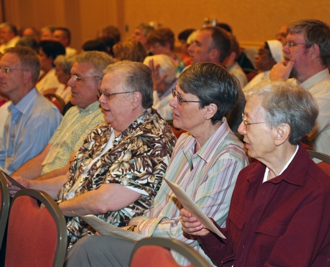 Participants in the annual meeting of the Pontifical Mission Societies pray during the opening Mass, celebrated by Archbishop Thomas Wenski.