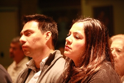 A couple takes part in the first Mass of prayer and intercession for couples struggling with infertility, celebrated April 19 at St. Timothy Parish in Miami.