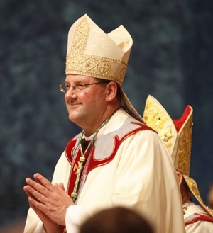 Bishop Gregory Parkes prepares to give his "thank yous" after being ordained a bishop.