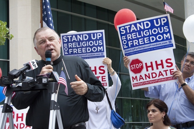 Archbishop Thomas Wenski addresses participants at the religious freedom rally in downtown Miami.