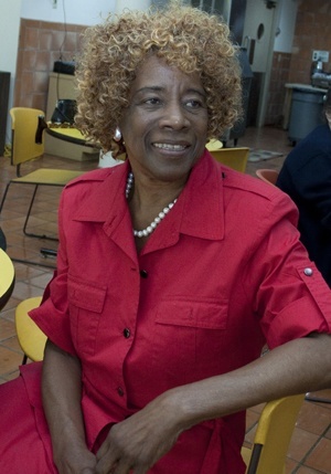 Maria Jerkins listens as fellow co-workers praise her work during 18 years as director of the Office of Black Catholic Affairs.