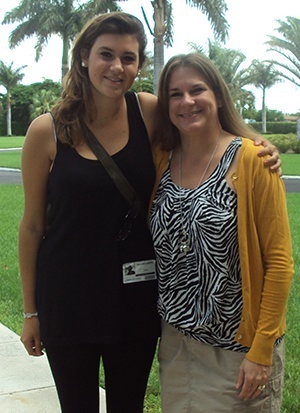 Former St. Brendan High exchange student Martina Bonvini of Milan, Italy, left, visits with Miriam Smith, co-director of the International Student Exchange Program at the archdiocesan high school.