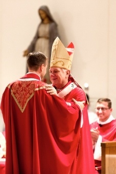 Miami Archbishop Thomas G. Wenski embraces Father David Toups during the Rite of Installtion of Rector on Sept. 21 at St. Vincent de Paul Regional Seminary in Boynton Beach. Father Toups is the 12th rector in the history of the seminary, which is a major theologate, and one of only two bilingual, multi-cultural, major Catholic seminaries in the United States.