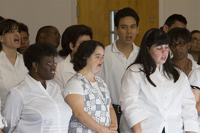 Marian Center students take part in the Mass for the school's 50th anniversary.