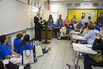 Mary Carter Waren, associate professor of theology at St. Thomas University, teaches a workshop on educating children while taking into consideration the families they come from and the communities in which they live. Space was at a premium as more than 1,100 catechists attended this year's catechetical conference.