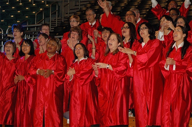 The St. Louis parish choir performs during the 50th anniversary Mass.