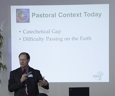Greg Kremer, director of diocesan program sales for Renew International, speaks to parish and ministry representatives gathered at the Pastoral Center for the Why Catholic? informational session.