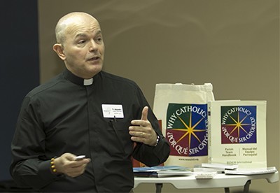 Father Alejandro Lopez-Cardinale, coordinator of Hispanic Programs for Renew International, speaks about the process and benefits of Why Catholic?/¿Por Que Ser Católico? during the information session at the Pastoral Center.