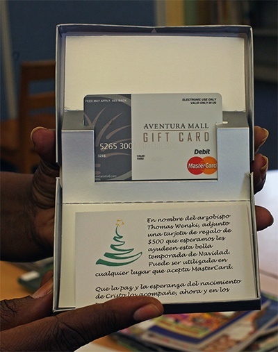 The 0 gift card that each of 55 families received.