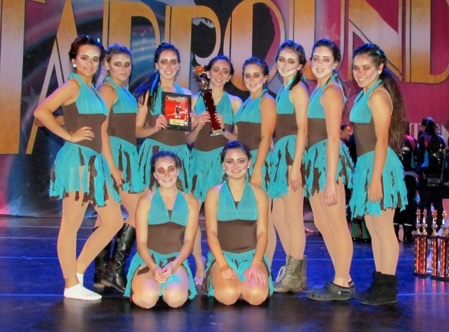 The Archbishop Coleman Carroll High School Sapphire Dancers proudly show their awards at the Starbound National Talent competition in Miami Beach. Back row, from left to right: Vanessa Bosch, Chrissy Nasser, Senior Dance Co-Captain Michelle Vazquez, Senior Dance Captain Sarah Castillo, Junior Dance Co-Captain Melissa Varela, Justine Cinalli, Cecilia Ruiz. Front row: Summer Settler, Elisa Garcia. Missing from the photo is dance team member Elise Perez.