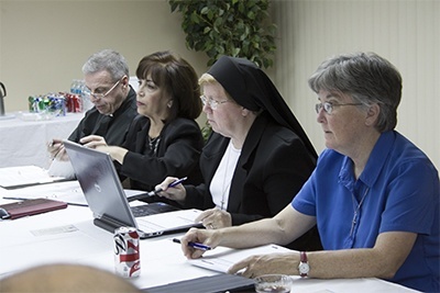 Members of the Synod task force on an archdiocesan pastoral council at their most recent meeting, from left: Msgr. Pablo Navarro, Vilma Angulo, Sister Elizabeth Worley and Sister Kathleen Carr, both Sisters of St. Joseph of St. Augustine.