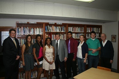 From left: Douglas Romanik, Curley Notre Dame principal, Megan Romanik, Kareen Etienne, Galisa Hyppolite, Judge Adalberto Jordan, Israel Calero, Jensen Rayburn, Patrick Toomey, and Christian Brother Conan Armstrong.
