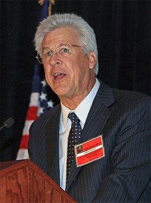 James E. Zloch, retired attorney, addresses the audience at dinner after receiving the annual Edward A. McCarthy award from the St. Thomas More Society.