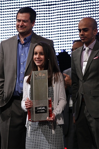 Blessed Trinity seventh grader Daniela Rodriguez poses with REC Foundation President Jason Morrella, left, and 
Karthik Kanagasabapathy, manager at Innovation First International, Canada, Inc., after being inducted into the STEM Hall of Fame at the VEX Robotics Competition World Championship in Anaheim, Calif., in April.