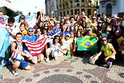 While waiting for the pope, members of the SEPI group make memories with other young adults from around the world.