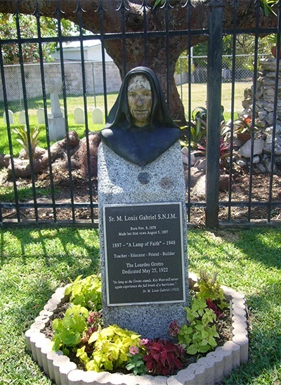 This bust of Sister M. Louise Gabriel, with her prayer that Key West be protected from storms, stands next to the grotto and shrine to Our Lady of Lourdes that she had built on the grounds of St. Mary Star of the Sea Church.