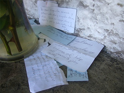 Scraps of paper with prayer requests are left at the grotto to Our Lady of Lourdes which is located on the grounds of the Basilica of St. Mary Star of the Sea in Key West.